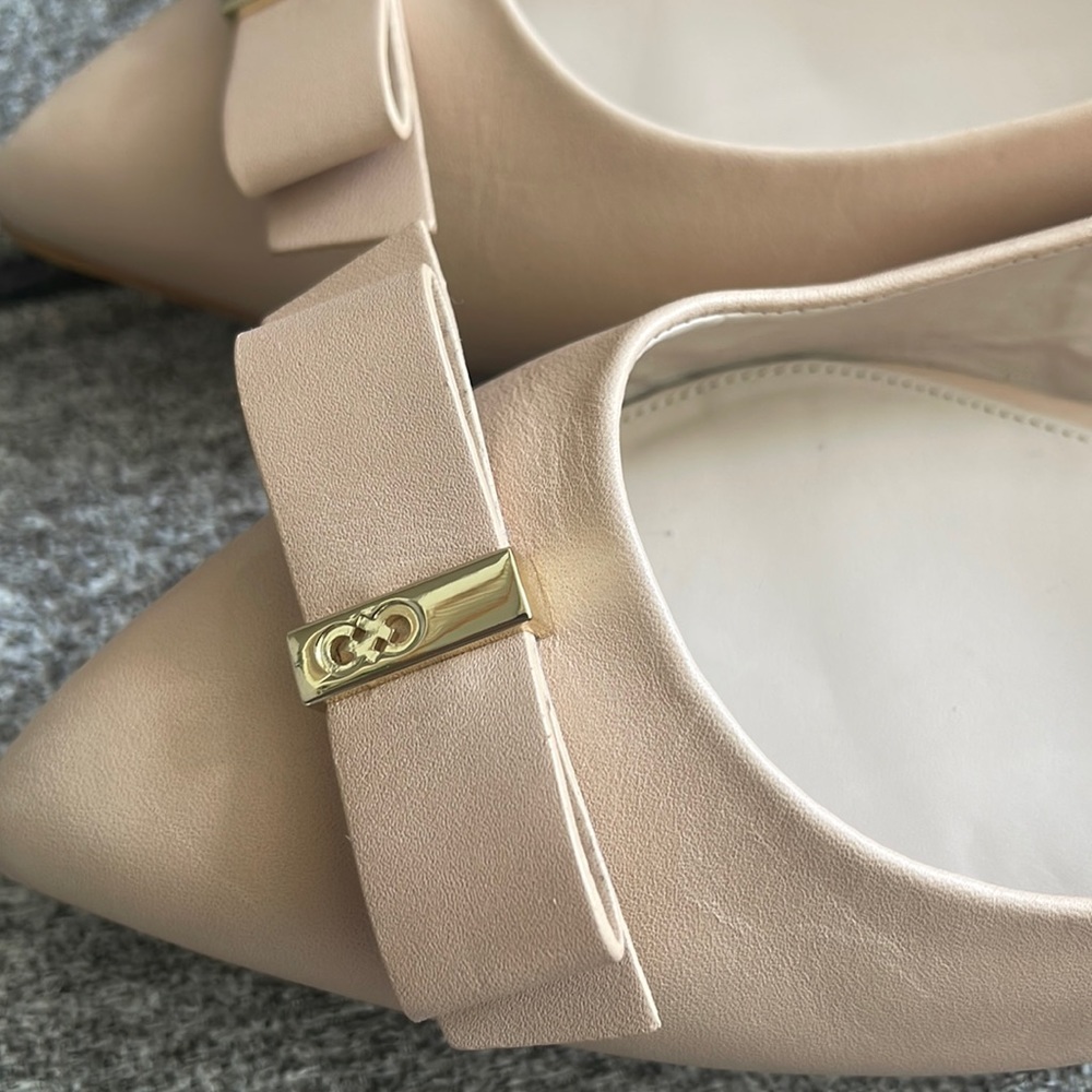 *New* Leather Cole Haan Cream Ballet Flats with manmade sole and lining.